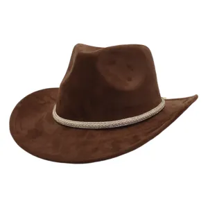 Detailed view of brown western cowboy hat with rhinestone braided band, wide brim suede sun hat.