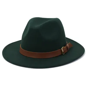 Close up of dark green fedora hat with brown leather belt and metal buckle detail.