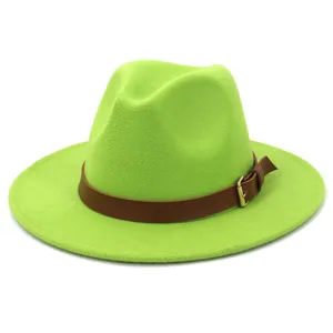 Detail view of the vibrant green felt fedora hat with brown leather belt and metallic buckle.