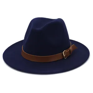 Navy blue wool fedora hat featuring a brown leather belt with metal buckle, detail view.