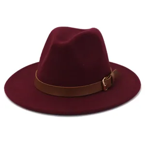 Wine red woolen fedora hat with brown leather strap and metal buckle, classic wide brim design.
