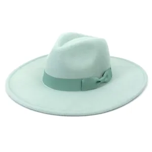 Καπέλο fedora πράσινης μέντας με φαρδύ γείσο λεπτομέρεια, μάλλινο υλικό και κομψός φιόγκος.
