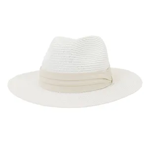 White straw fedora hat with beige ribbon band detail, summer beach sun protection.