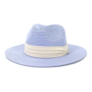 Light blue straw fedora hat with beige band, perfect summer beach sun protection accessory.