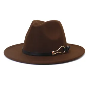 Brown felt fedora hat detail view showcasing classic wide flat brim and elegant leather strap.