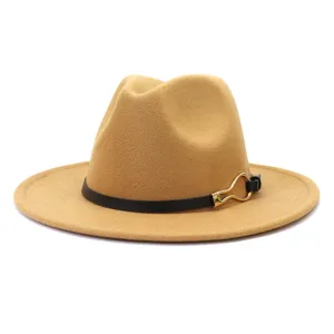 Detailed close-up of the elegant camel wool fedora hat with black belt and gold buckle design.