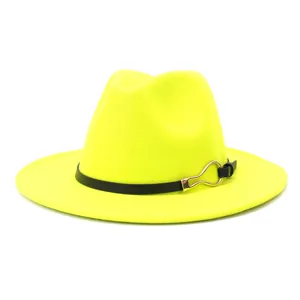 Close-up detail of the fluorescent yellow wool fedora hat with black belt and gold buckle.