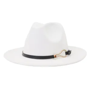 Detail view of the white wool felt fedora hat, featuring a sleek black strap and gold buckle.