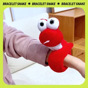 Cute red snake slap bracelet plush toy detail shot, soft stuffed animal wristband gift.