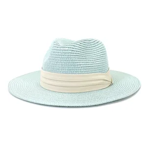 Detailed view of light green straw fedora hat with beige band for summer beach sun protection.