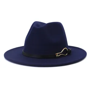 Dark blue fedora hat detail, elegant black leather strap with gold metal buckle accent.