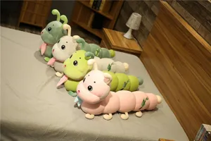 Cute long caterpillar plush toy, soft pillow doll with scarf for kids sleeping comfort, detail view.