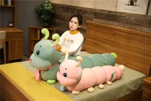 Cute long caterpillar plush toy with scarf, soft stuffed pillow for kids and cozy decor.