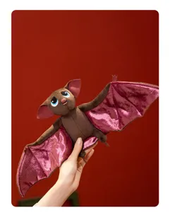 Cute brown vampire bat plush toy with shiny pink wings, perfect for Halloween decor.