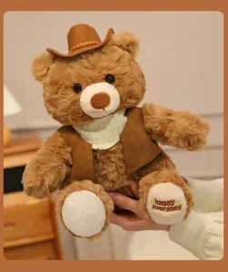 Cute brown plush teddy bear detail shot, wearing a cowboy hat and vest, soft toy gift.