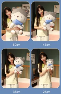 Cute cat plush toy with blue fish detail shot, soft stuffed animal for bedroom decoration.
