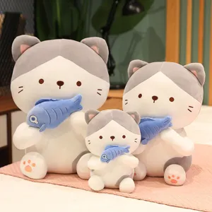 Cute sitting cat plush toy holding a fish, soft doll pillow for kids and girls sleeping.