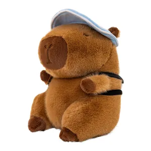 Mignon jouet en peluche capybara avec chapeau bleu sac à dos, poupée en peluche douce cadeau enfant.