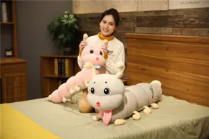 Detailed view of the cute caterpillar plush toy with scarf, soft long hugging pillow for kids.