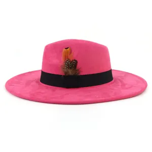 Pink suede fedora hat with black band and feather detail, wide brim jazz cap for women.