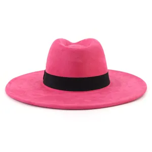 Faux suede wide brim fedora hat for women, elegant pink jazz cap with black band detail.