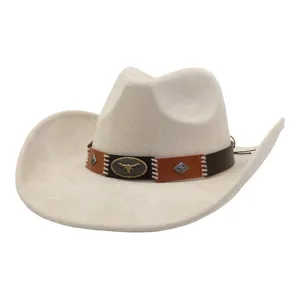 Detail view of a beige faux suede cowboy hat with brown leather band and bull skull decor.