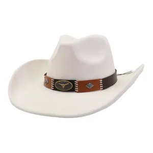 Detail view of a white suede cowboy hat featuring a brown leather band and metal bull skull.