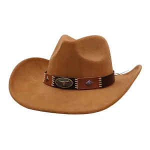 Detail view of brown suede cowboy hat with western bull skull metal buckle band.