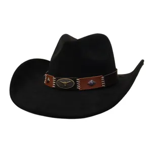 Detailed closeup view of the exquisite metal bull skull emblem on the stitched leather hatband.
