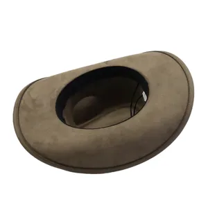 Detailed view of the stylish suede cowboy hat inner lining and wide brim texture, casual design.