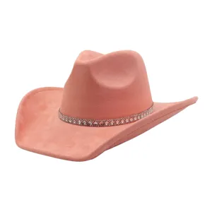 Pink suede cowboy hat detail, rhinestone hatband, stylish western jazz hat close up.