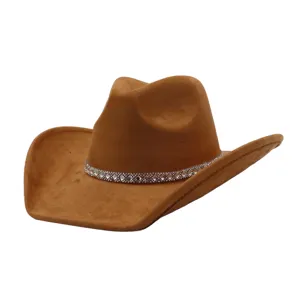 Detailed view of the brown faux suede cowboy hat featuring a dazzling rhinestone band.
