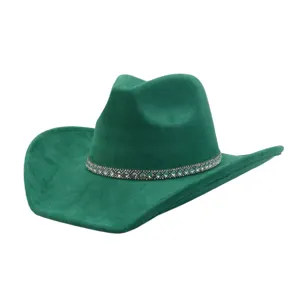 Green suede cowboy hat with sparkling rhinestone band, wide brim western fedora detail view.