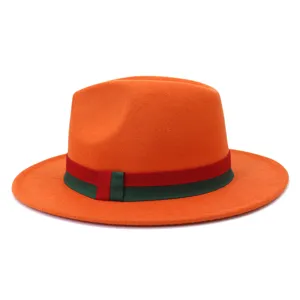 Detailed view of a stylish wool fedora hat with a contrast red and green ribbon band.