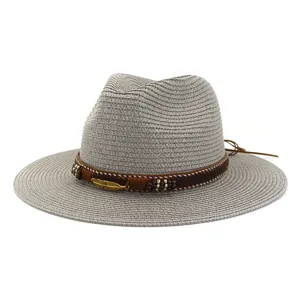 Stylish gray straw fedora hat for women with boho beaded band and gold feather decoration.
