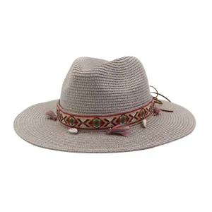 Summer straw sun hat with 7cm wide brim, ethnic embroidered band and tassel beach cap.
