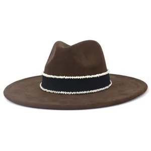 Brown suede wide brim fedora hat detail featuring elegant white beaded trim and black band.