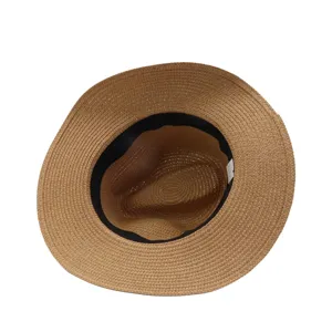 Detail view of the woven straw sun hat texture, showing the breathable brim and inner black band.