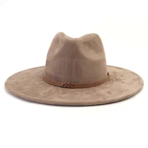 Detailed view of brown suede fedora hat for men and women, wide brim stylish gentleman cap.