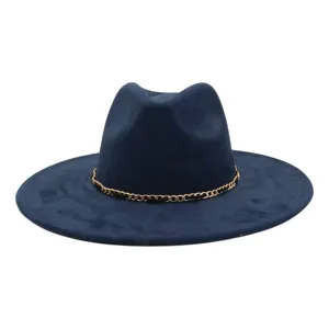Detail view of navy blue suede fedora hat featuring a stylish metallic gold chain.