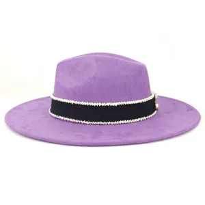 Detail shot of the elegant purple suede fedora hat with beaded band and side buckle trim.
