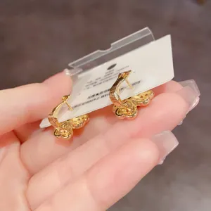 Exquisitos pendientes de trébol de cuatro hojas chapados en oro zircon joyas elegantes para mujer