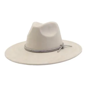 Detailed close-up view of beige suede fedora hat featuring sparkling rhinestone rope band.