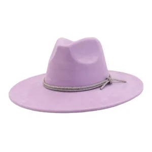 Close-up detail of the elegant purple faux suede fedora hat featuring a sparkling rhinestone band.