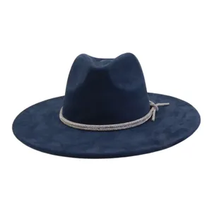 Detailed closeup of dark blue suede fedora hat with elegant sparkling rhinestone band trim.