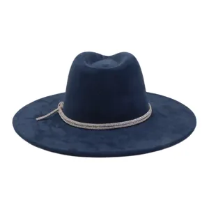 Dark blue suede fedora hat detail, elegant rhinestone band, wide flat brim winter fashion.