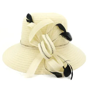 Elegant organza sun hat detail featuring black feathers and sparkling rhinestones for stylish beachwear.