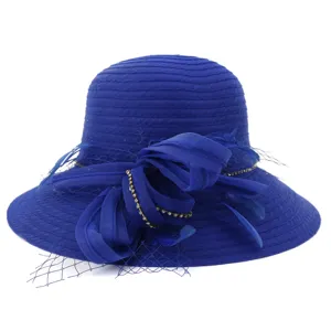 Detailed view of the elegant blue organza sun hat with mesh bow and sparkling rhinestone chain.