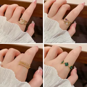 Detailed view of fashion gold plated cubic zirconia rings with elegant minimalist design.