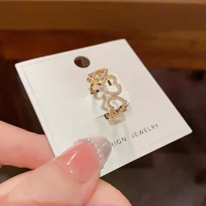 Gold-plated multi-heart zircon open ring detail, stylish and elegant finger jewelry.